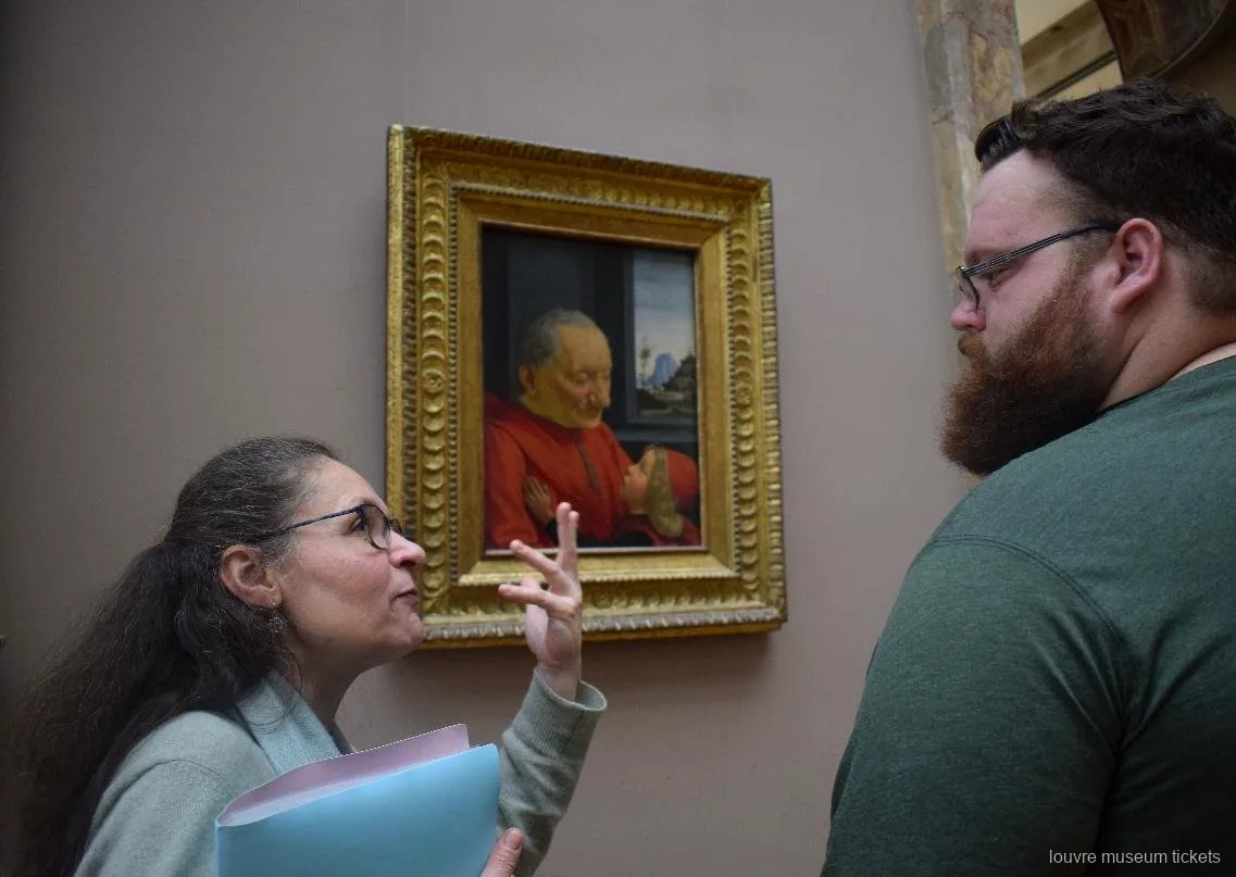 Guide expliquant un portrait Renaissance d'un vieillard et d'un enfant, visite avec billets musée du Louvre
